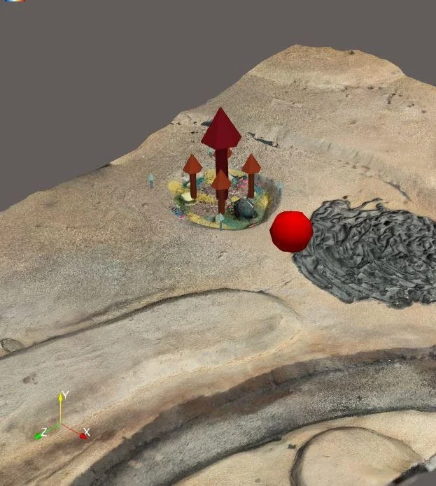 The VR scene: the rover as a red sphere, with geocache markers